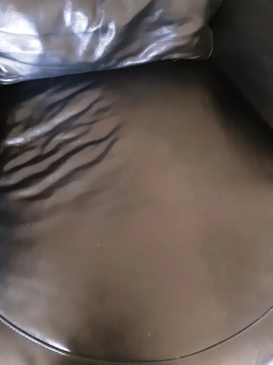 DFS Black Leather Cuddle Chair