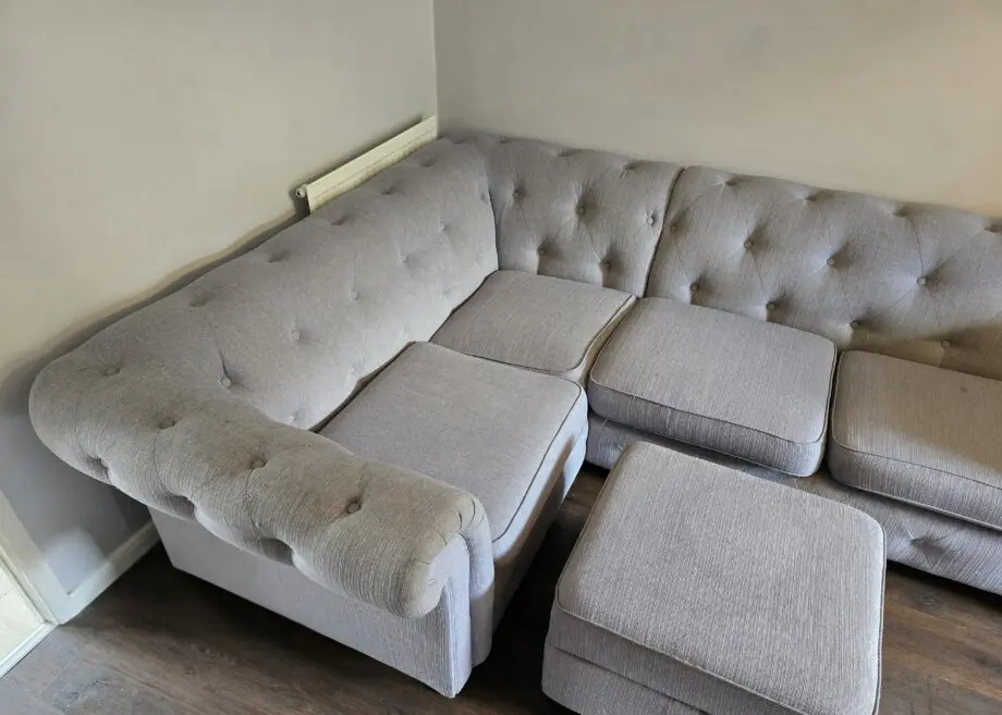 DFS Amour right hand facing corner in ash grey with matching footstool