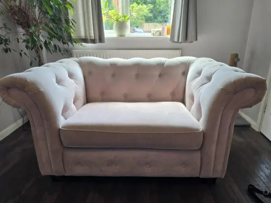 DFS cuddle chair in Old Rose Pink