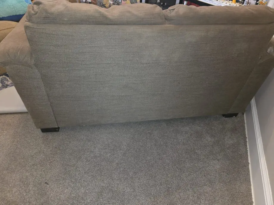 Brown 2 seater sofa. Unknown brand