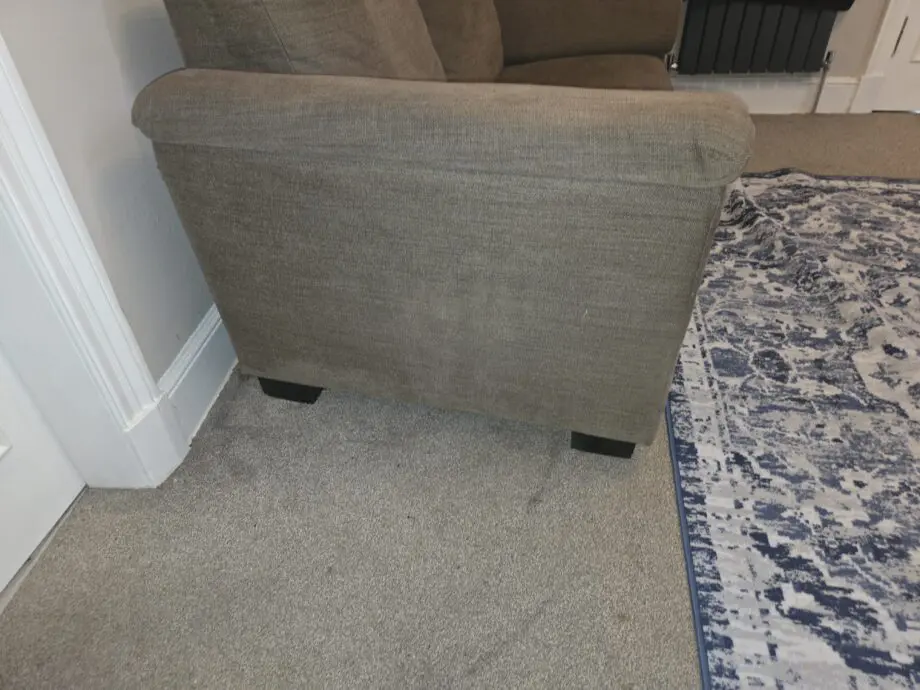 Brown 2 seater sofa. Unknown brand