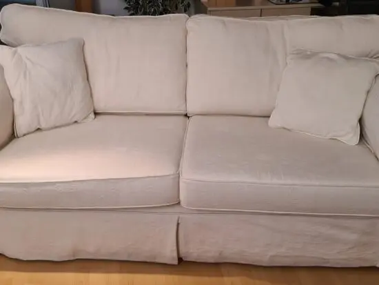 Two identical cream/white classic 3 seater sofas