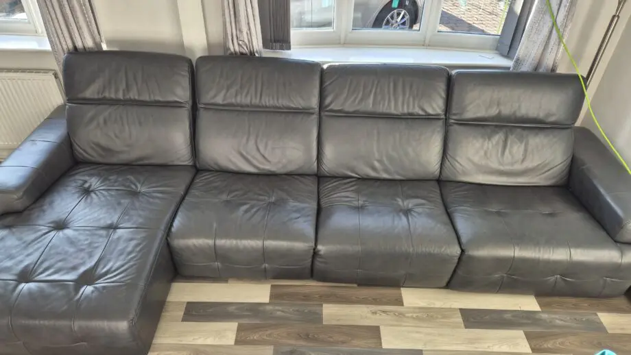 DFS BLACK L SHAPED 4 SEATER SOFA