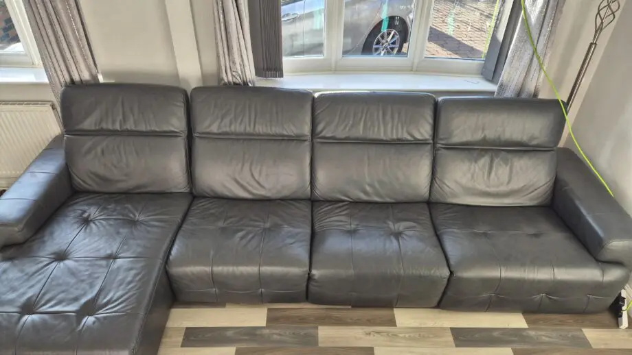 DFS BLACK L SHAPED 4 SEATER SOFA