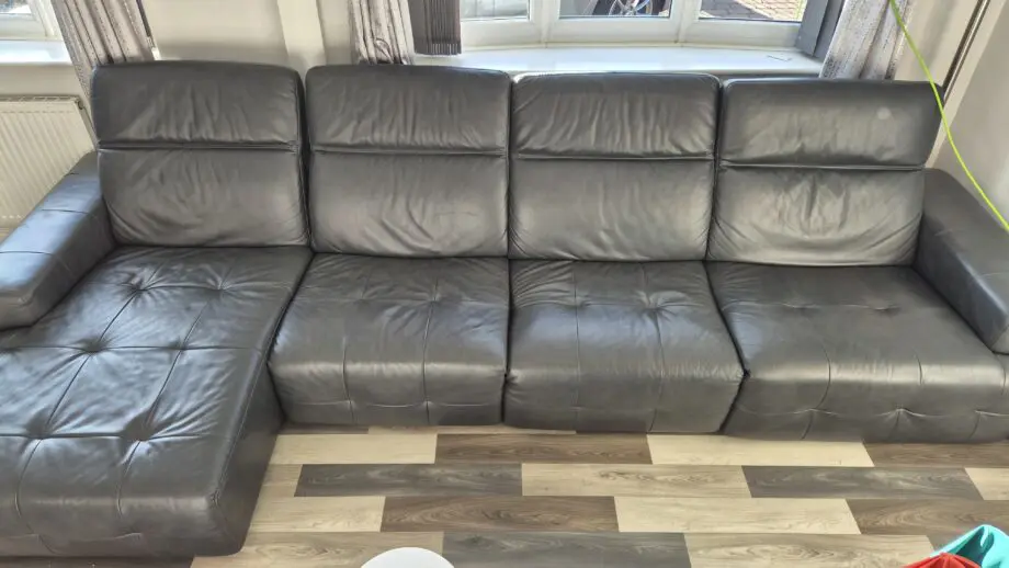 DFS BLACK L SHAPED 4 SEATER SOFA