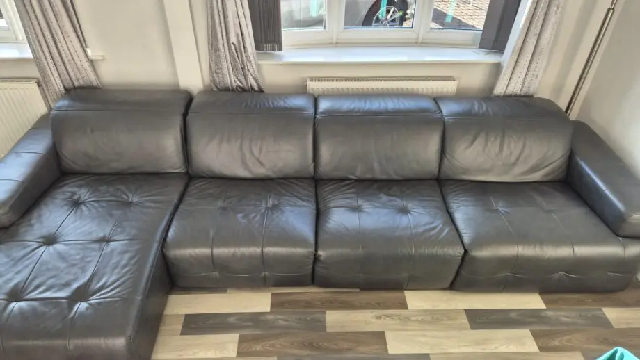 DFS BLACK L SHAPED 4 SEATER SOFA