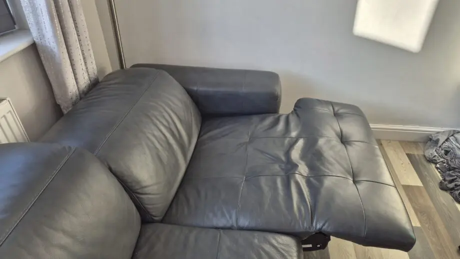 DFS BLACK L SHAPED 4 SEATER SOFA
