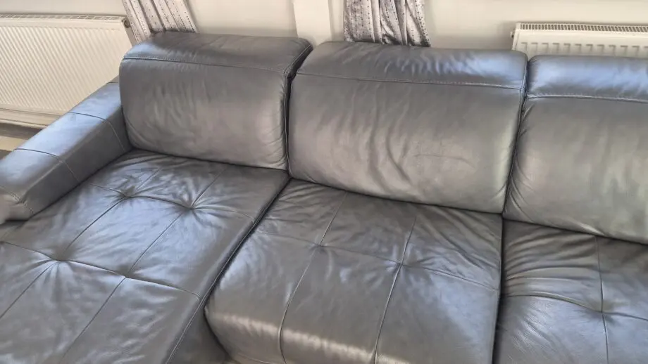 DFS BLACK L SHAPED 4 SEATER SOFA