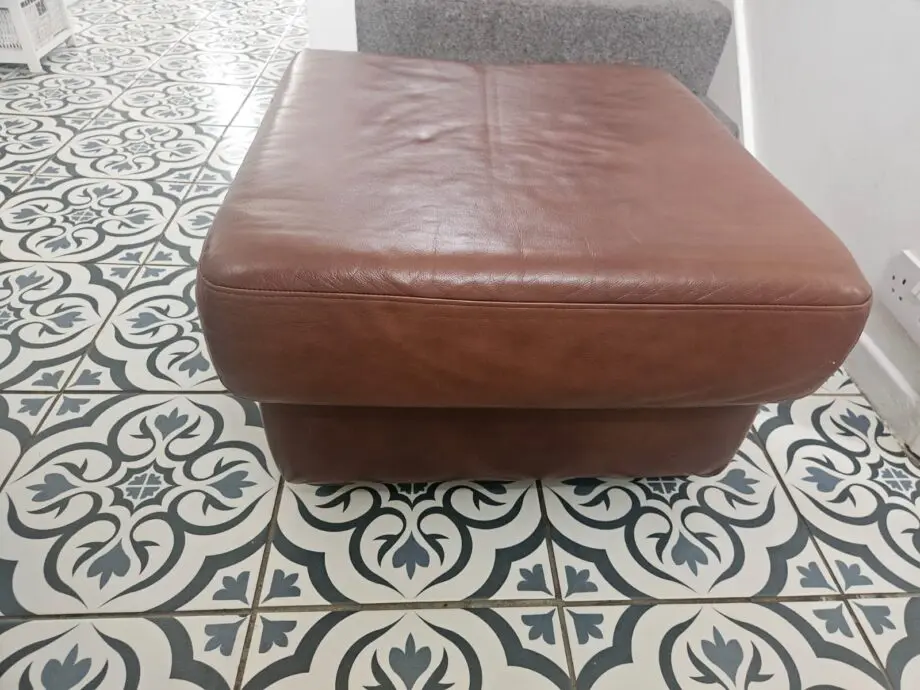 Brown 2x 2 seater leather sofas and footstool with storage