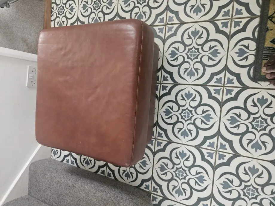 Brown 2x 2 seater leather sofas and footstool with storage