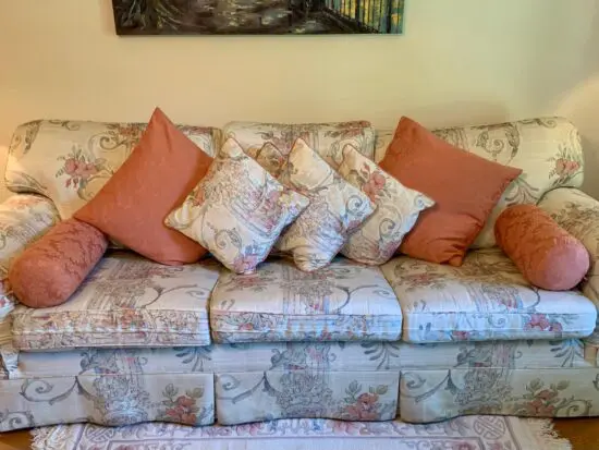 Beautiful MultiYork 3 seater sofa , 2 seater sofas and footstool. Mint condition. 15 square cushions included