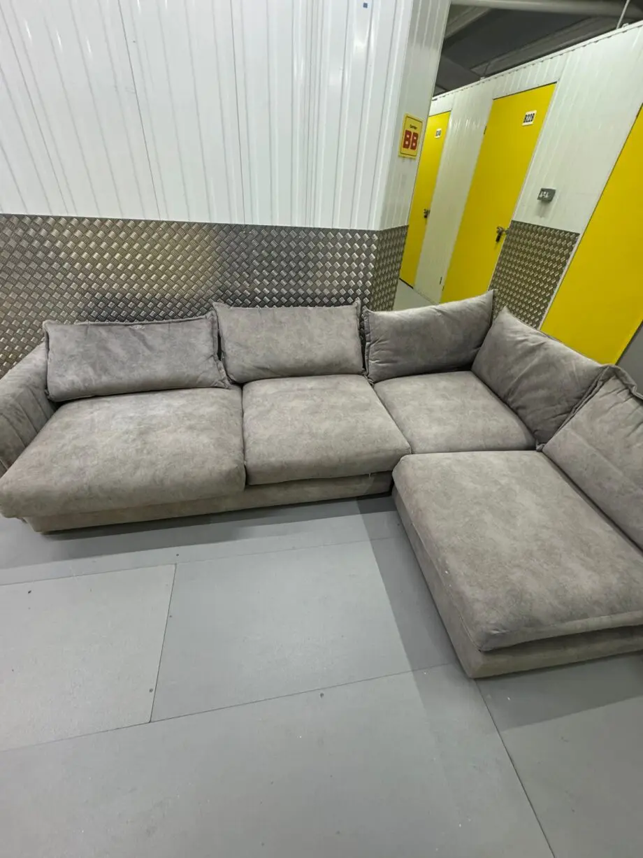 Dfs grey corner sofa with foot stall