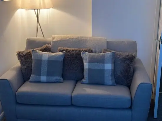 DFS Grey two seater sofa.