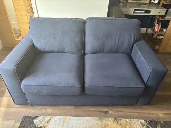 Oak Furnitureland Texas blue two seater sofa