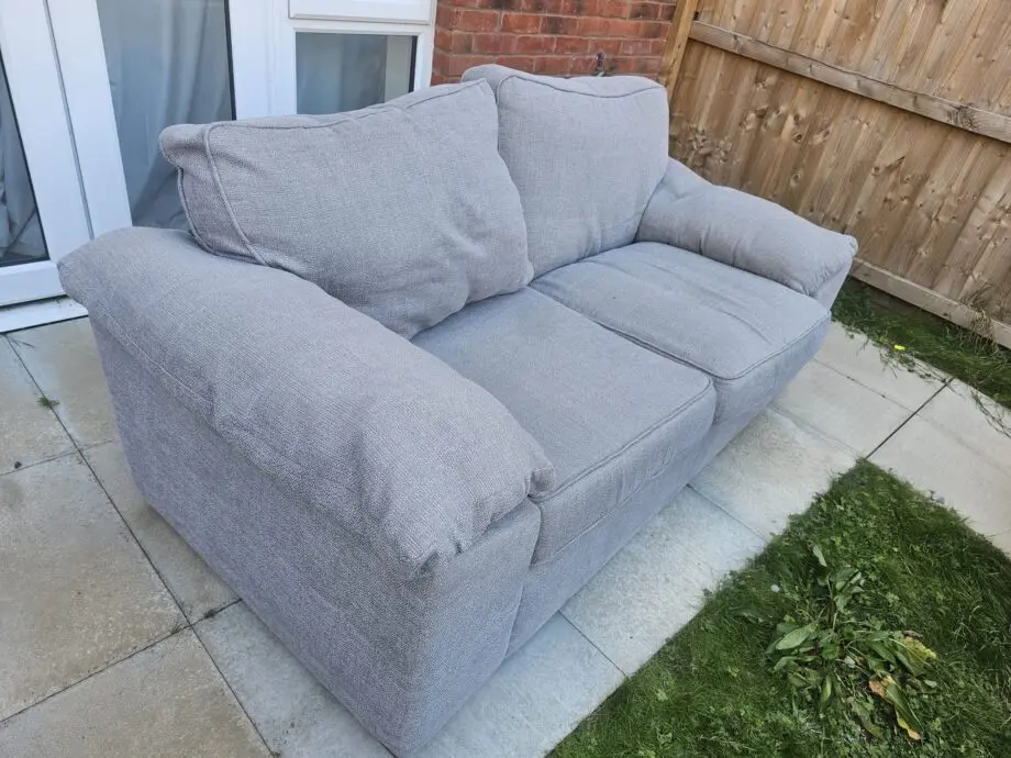 Grey colored fabric 2-seater