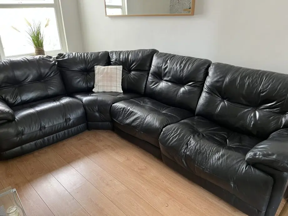 Black Italian leather corner sofa