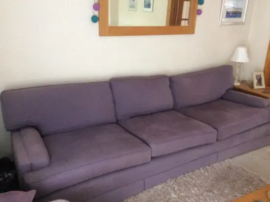 very elegant four seater sofa soft Damson colour