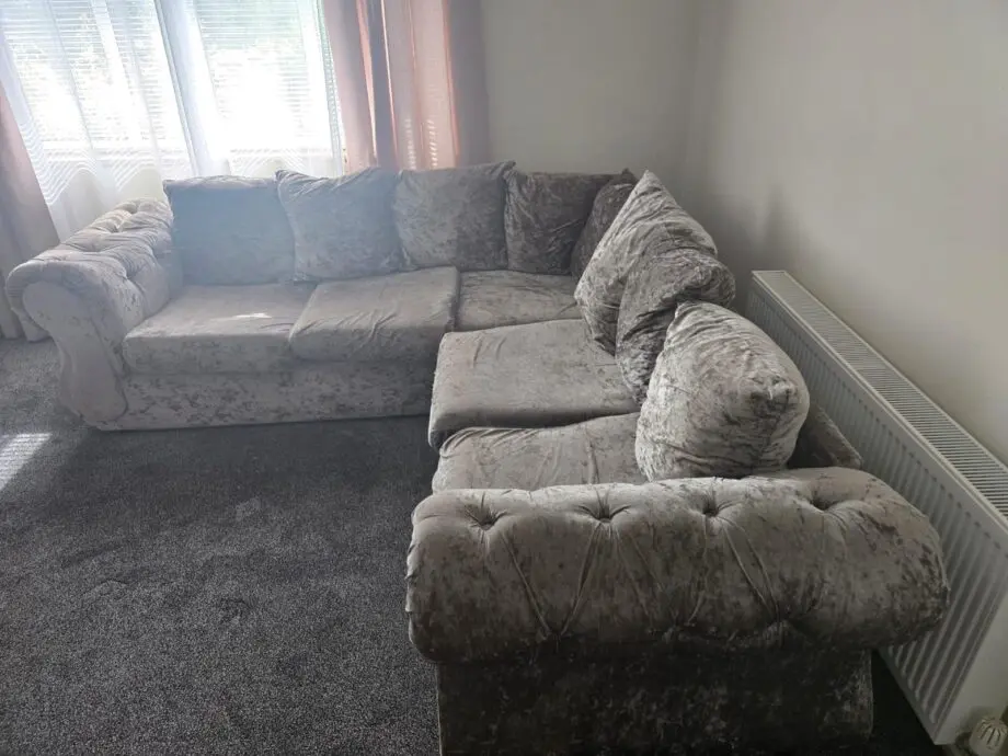 Grey velvet L shape sofa