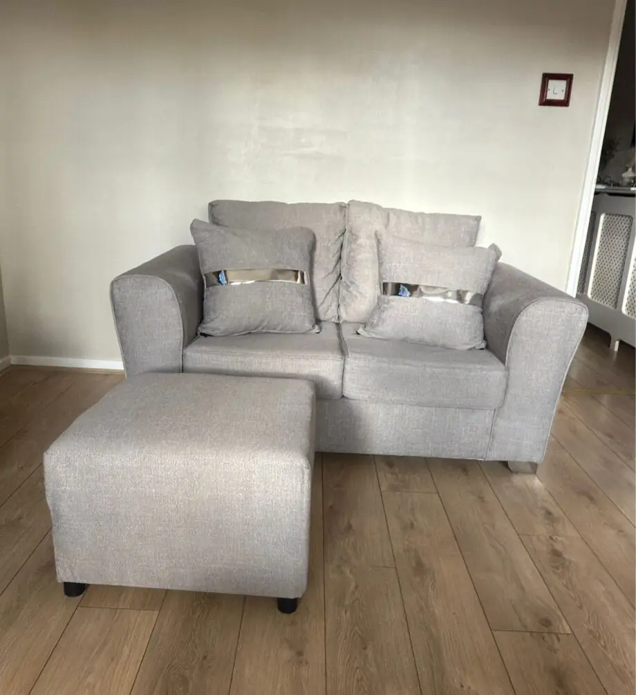 2x2 grey sofa with matching footstall