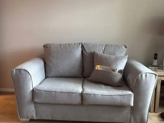 2x2 grey sofa with matching footstall
