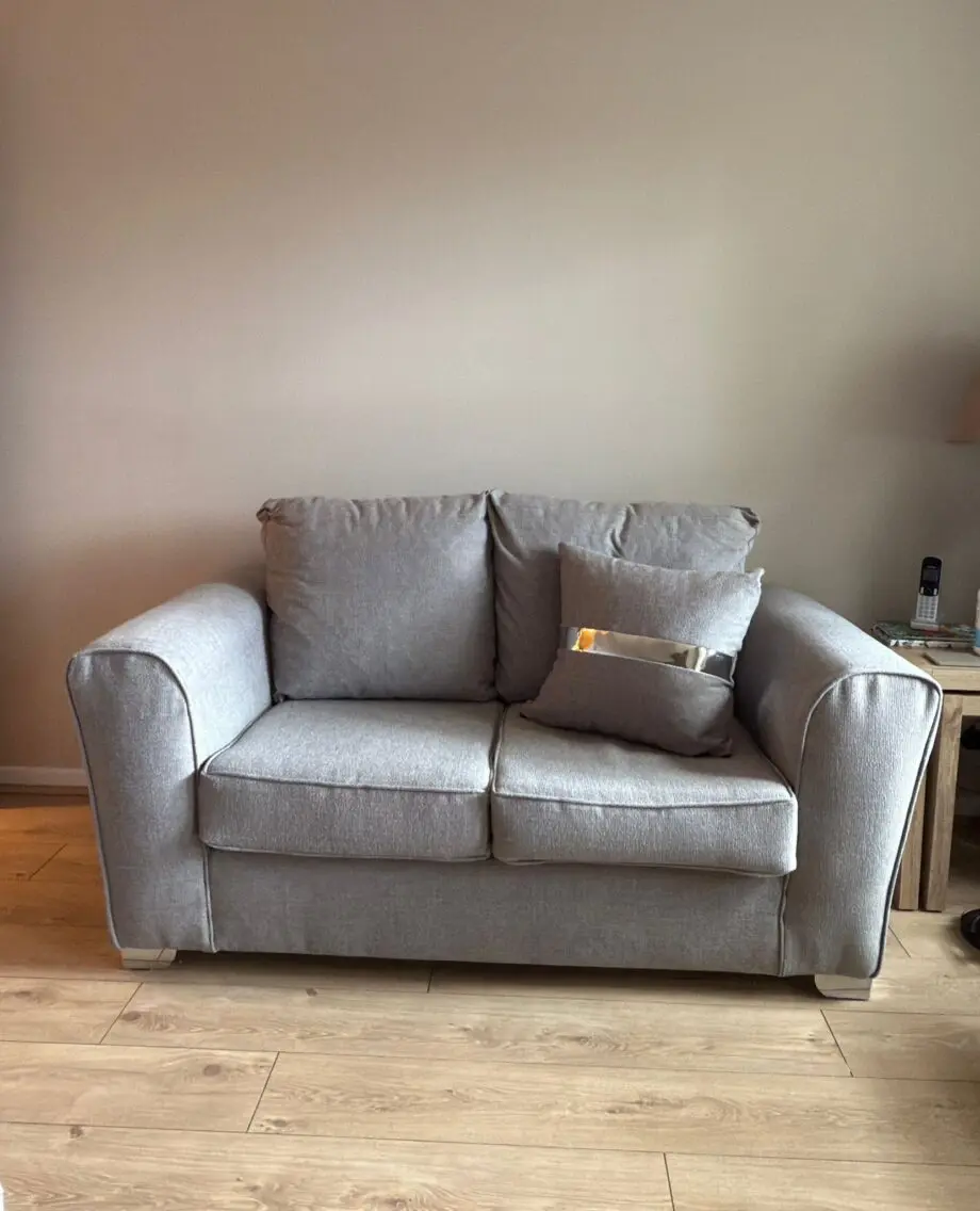 2x2 grey sofa with matching footstall
