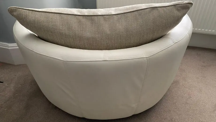 Round snuggle sofa and swivel snuggle chair