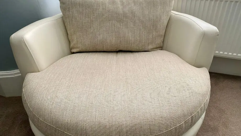 Round snuggle sofa and swivel snuggle chair