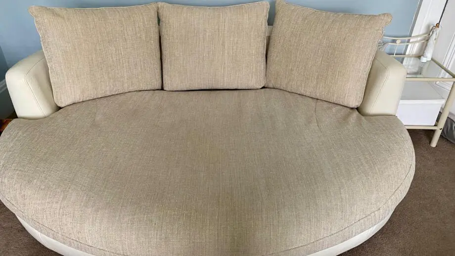 Round snuggle sofa and swivel snuggle chair