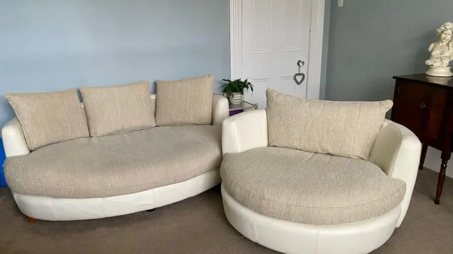 Round snuggle sofa and swivel snuggle chair
