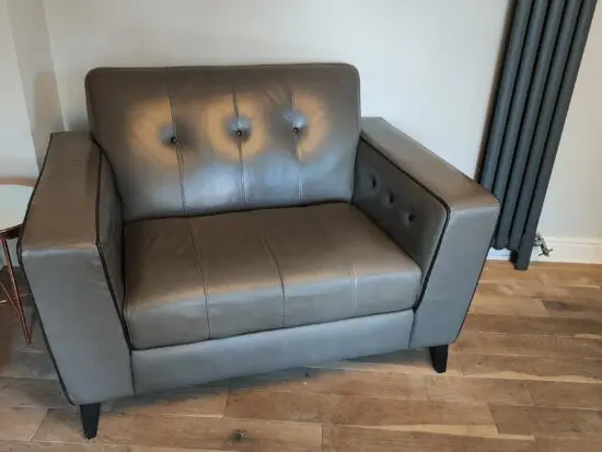 Grey leather snuggle chair