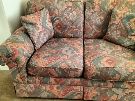 Marks and Spencer light terracotta and beige mix two seater sofa