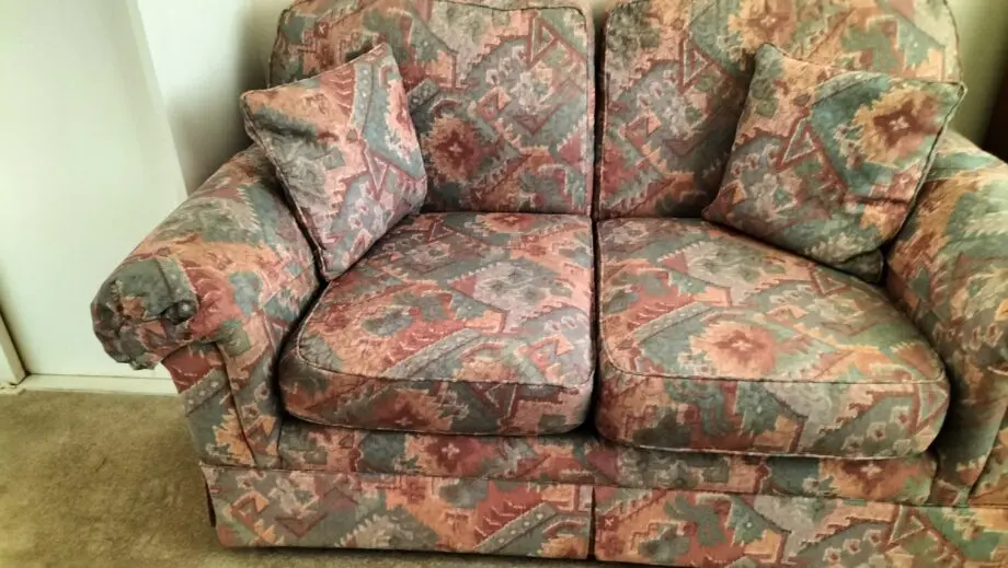 Marks and Spencer light terracotta and beige mix two seater sofa