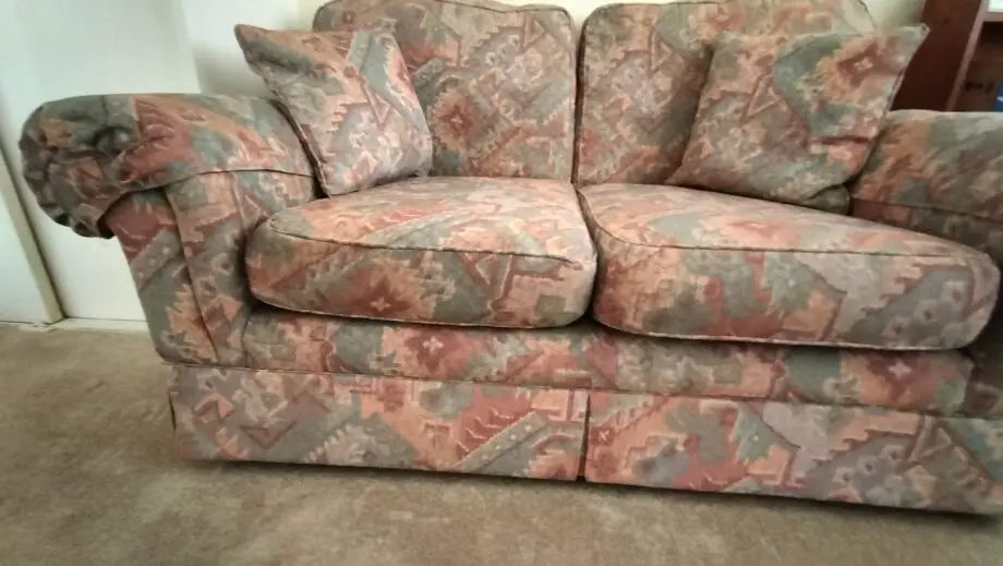Marks and Spencer light terracotta and beige mix two seater sofa