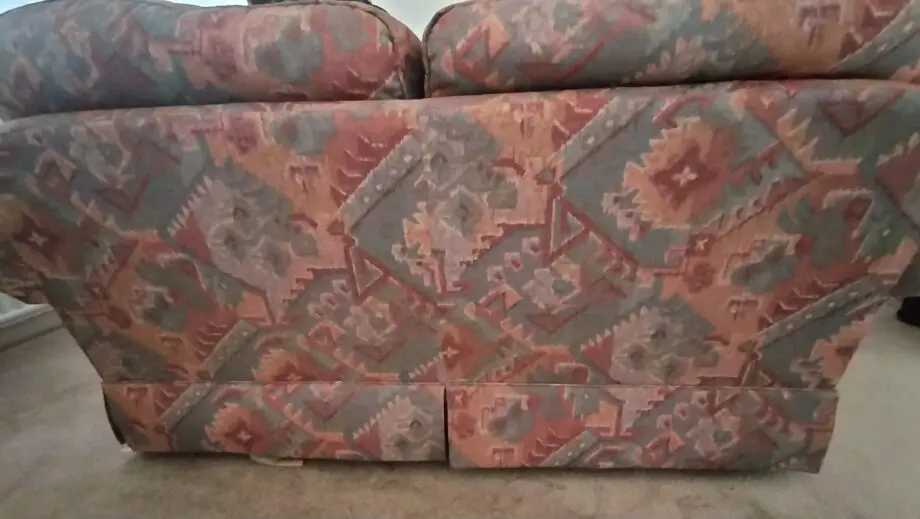 Marks and Spencer light terracotta and beige mix two seater sofa