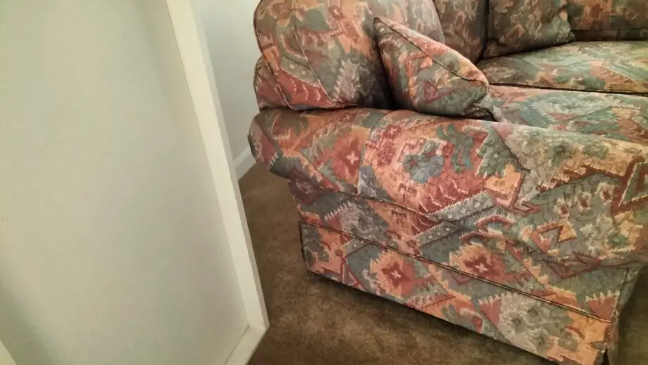 Marks and Spencer light terracotta and beige mix two seater sofa