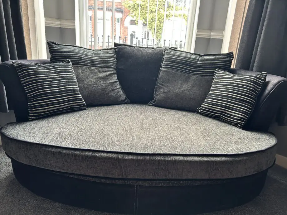 DFS Charcoal/black 3/4 seater sofa and large cuddle chair