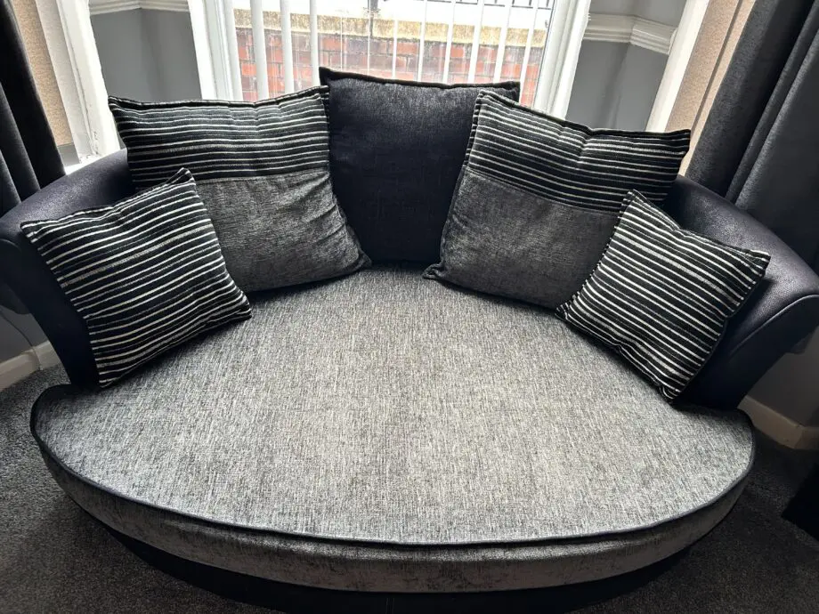 DFS Charcoal/black 3/4 seater sofa and large cuddle chair