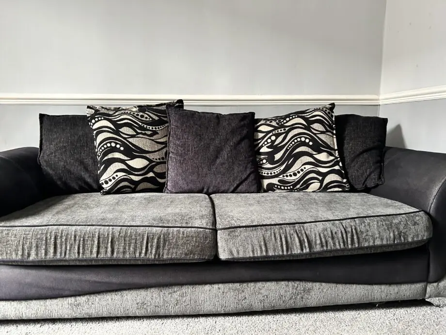 DFS Charcoal/black 3/4 seater sofa and large cuddle chair
