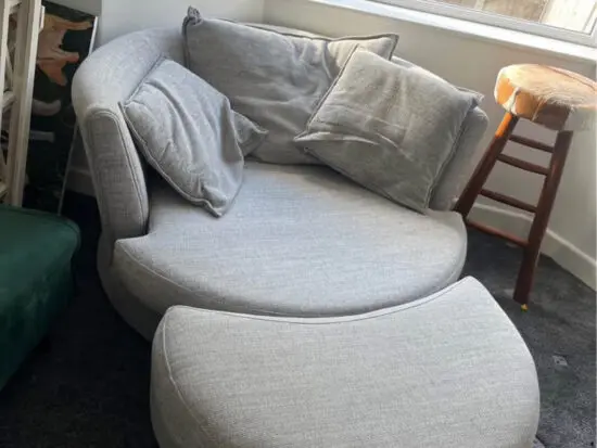 DFS grey Swivel Sofa