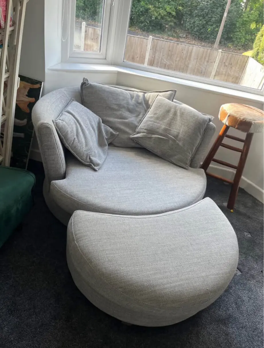 DFS grey Swivel Sofa