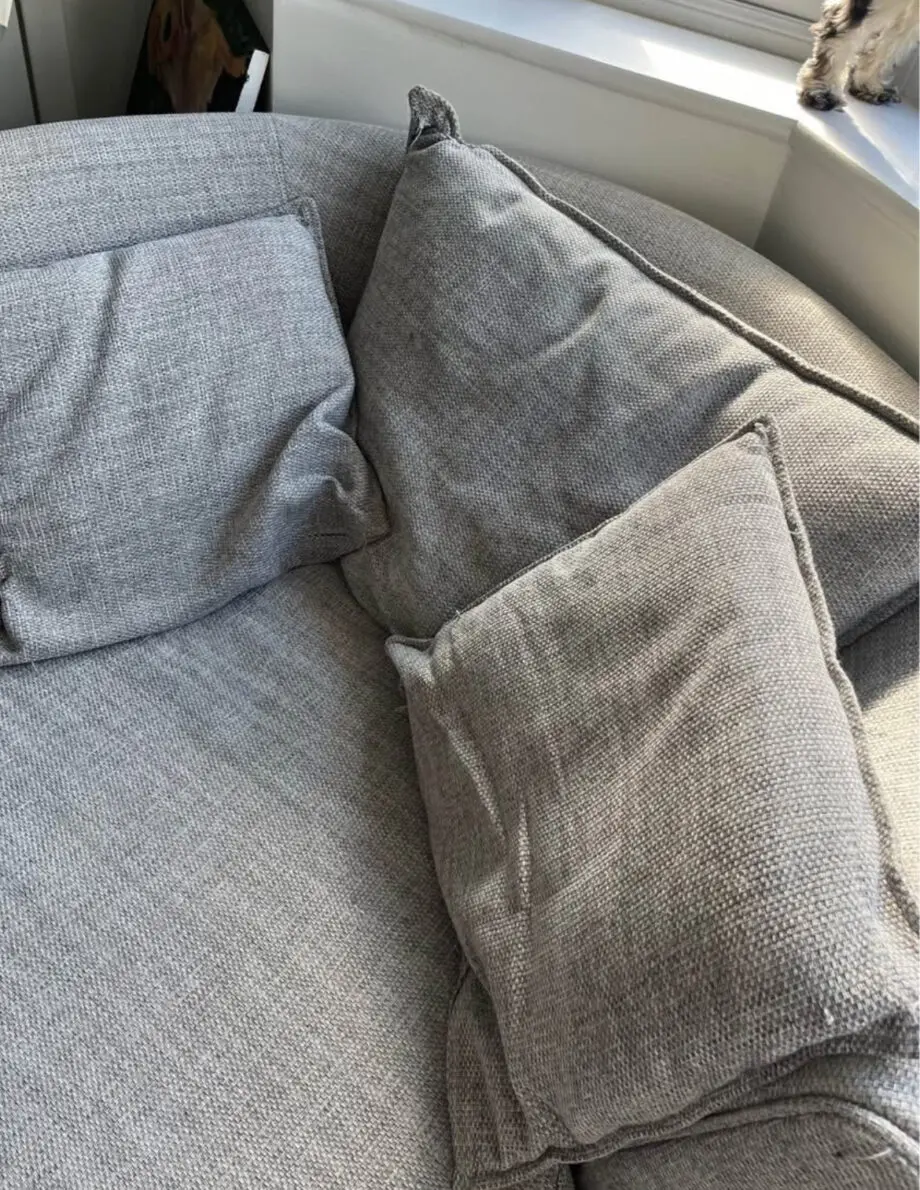 DFS grey Swivel Sofa