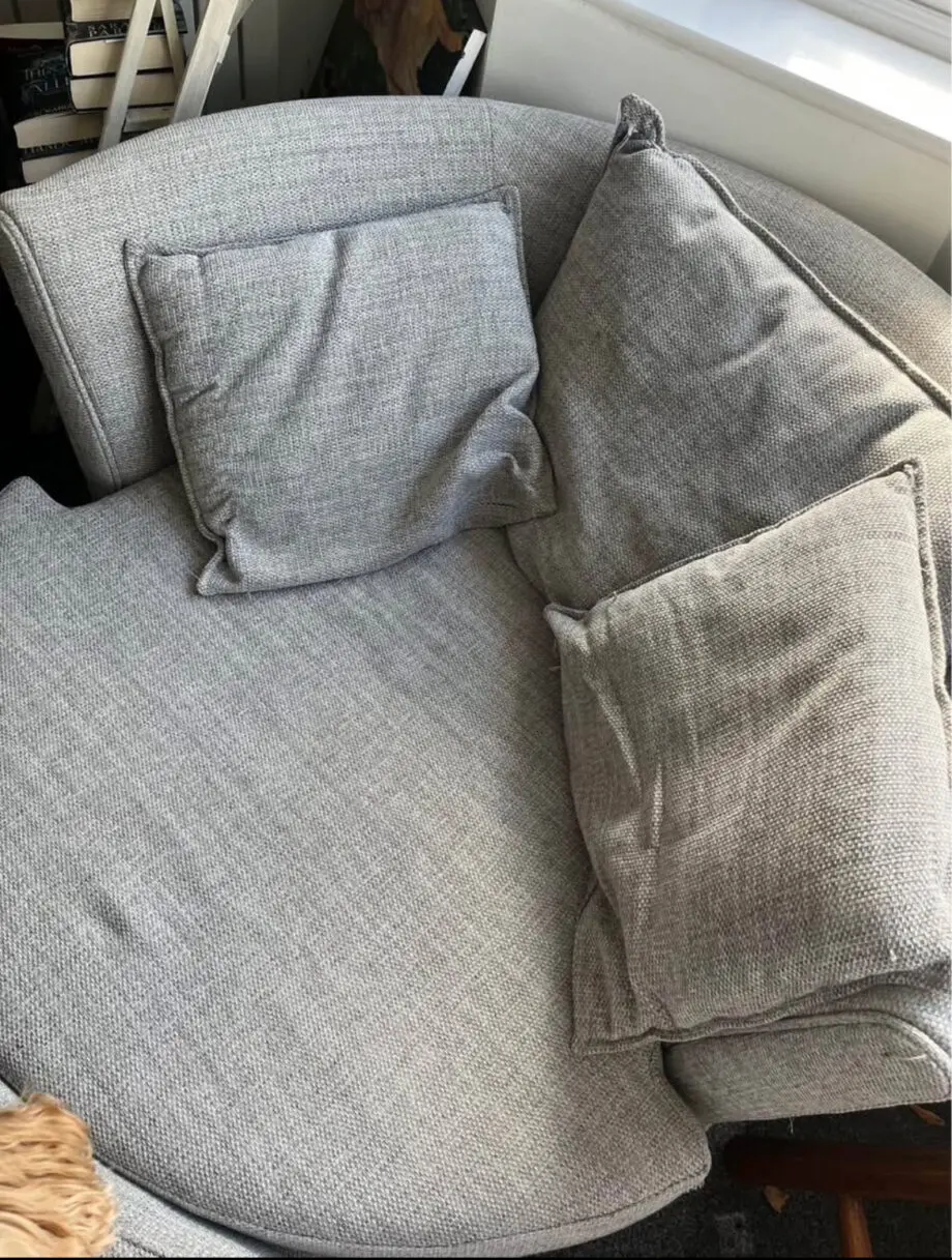 DFS grey Swivel Sofa