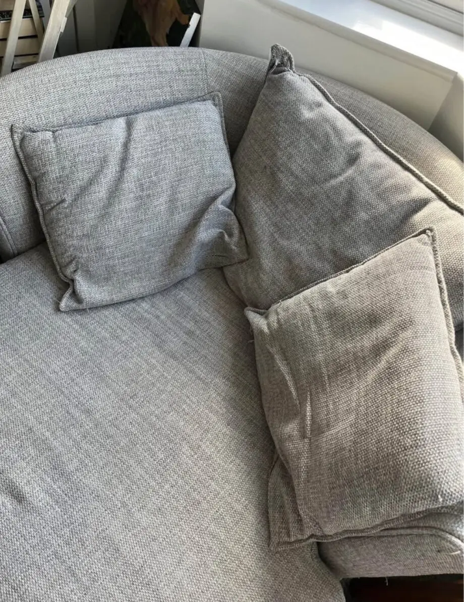 DFS grey Swivel Sofa
