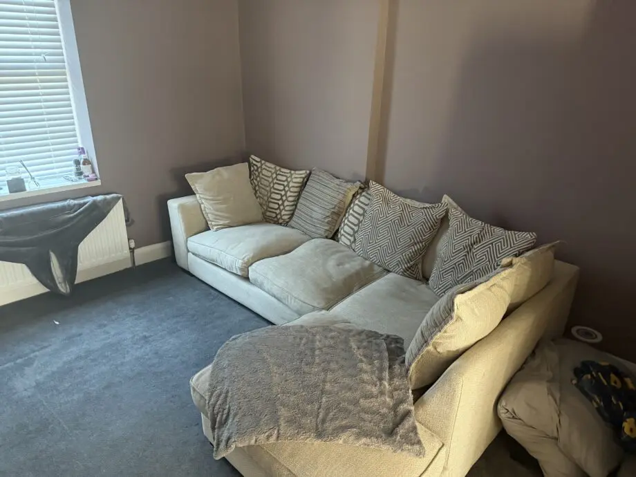 DFS cream L shaped sofa 4 seater