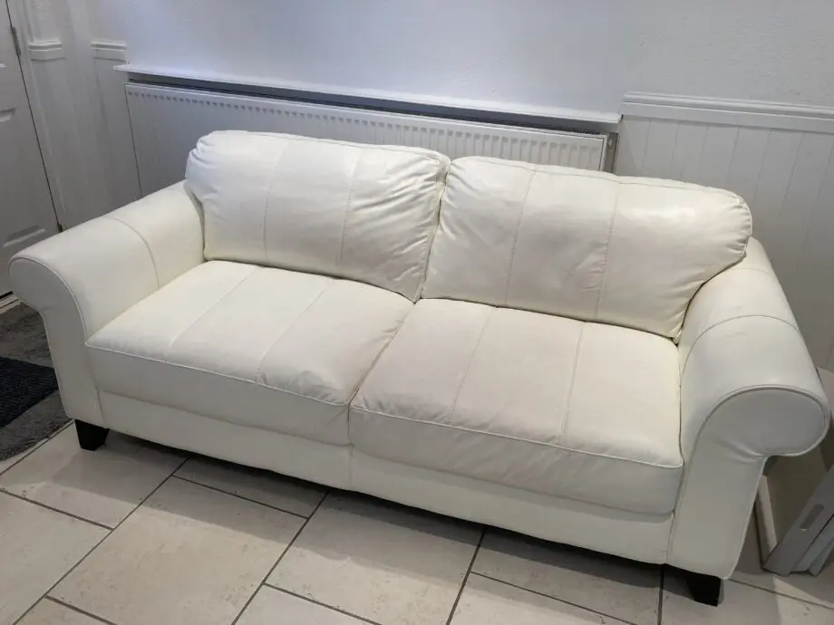 White Soft Leather 2 Seater Sofa. Not used - No marks Excellent condition