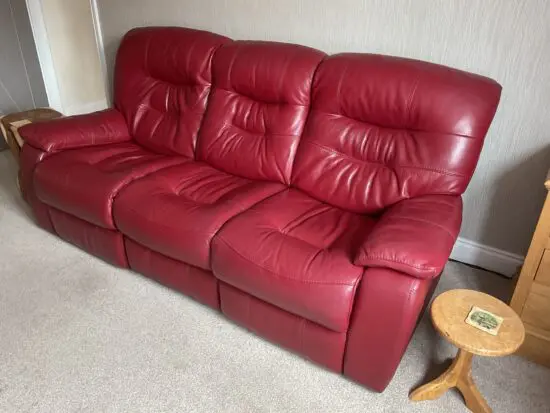 Red leather three seat power recliner
