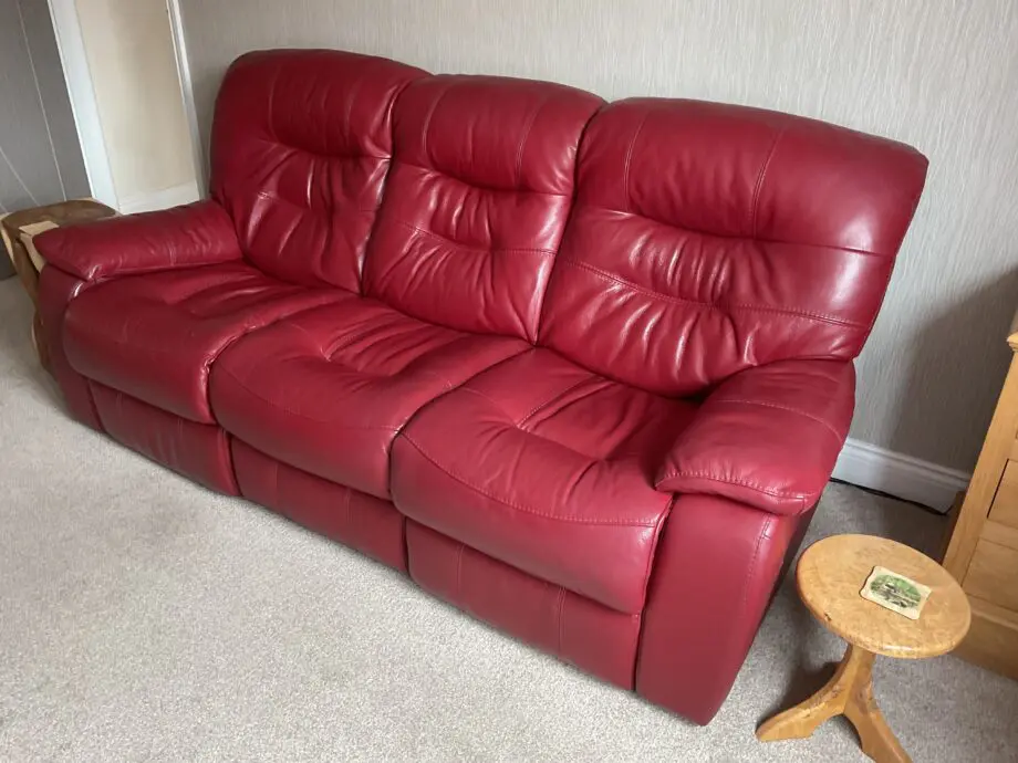 Red leather three seat power recliner