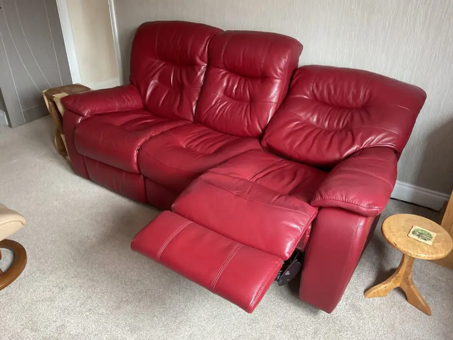 Red leather three seat power recliner