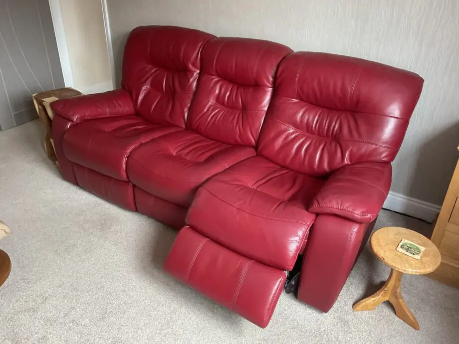 Red leather three seat power recliner
