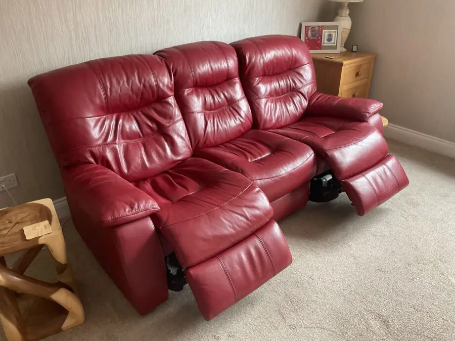 Red leather three seat power recliner